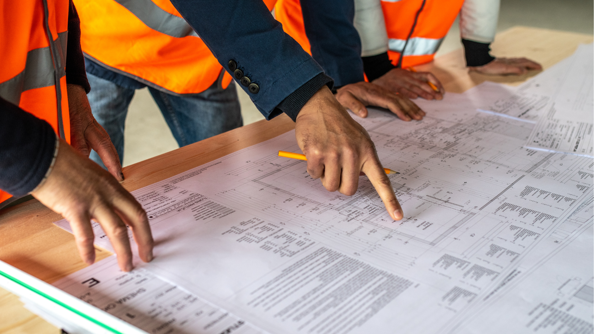 Blog featured image: a construction team planning a project