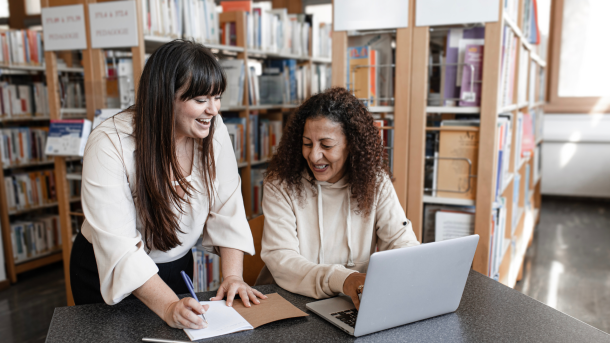 Blog featured image: two women working together on Sage Intacct for nonprofits